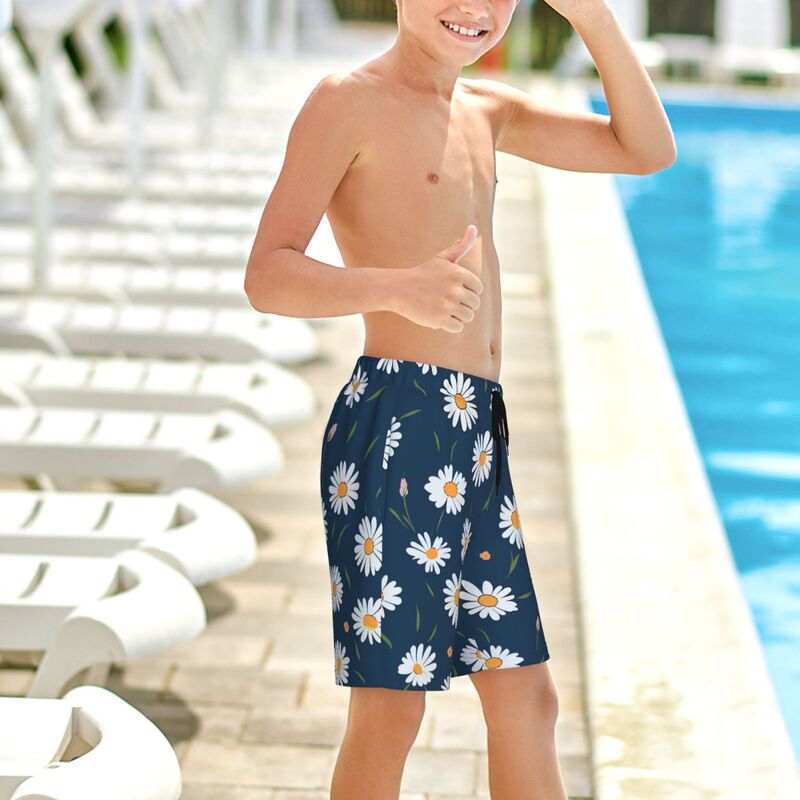 Huglittle Vibrant Blue Teen Beach Trunks with Whimsical Daisy Design