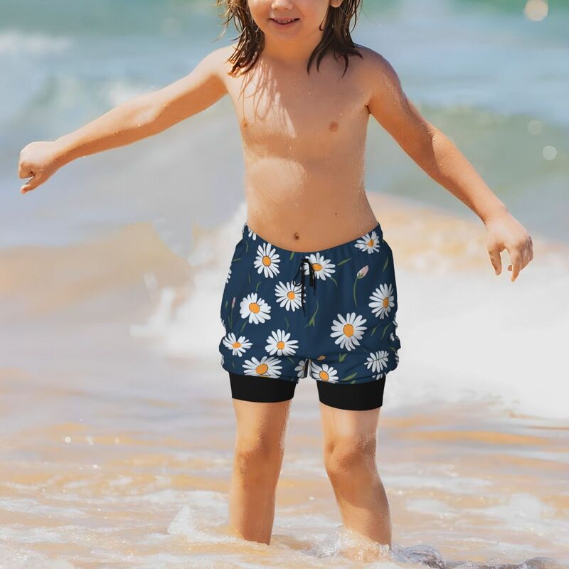 Huglittle Vibrant Blue Teen Beach Trunks with Whimsical Daisy Design